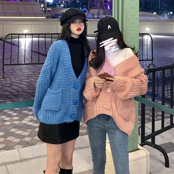 Vastag női mellény gombokkal és zsebekkel