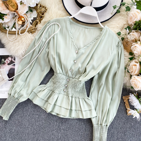 Modern női ing spitz nyakkivágással és elasztikus derékkal