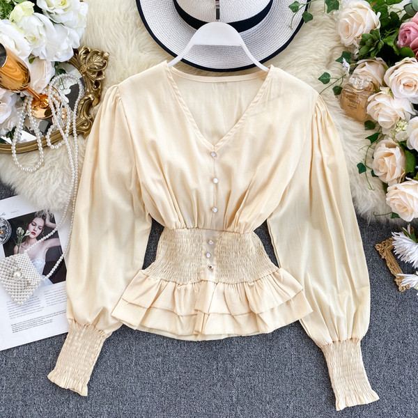 Modern női ing spitz nyakkivágással és elasztikus derékkal