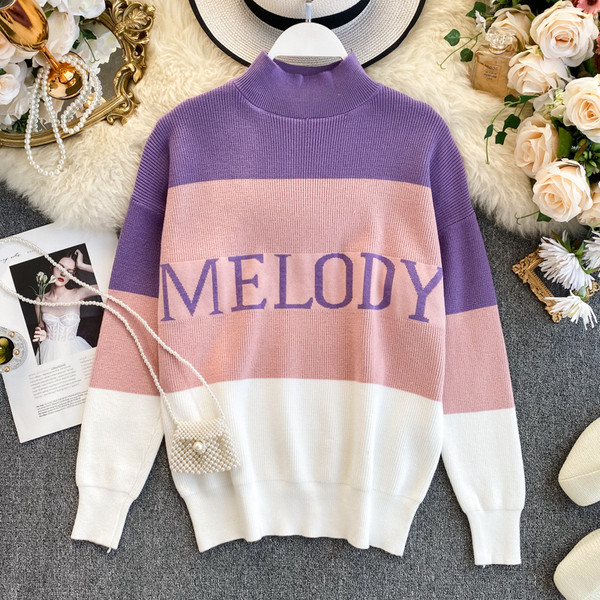 Alkalmi női pulóver pólógallérral és felirattal három színben