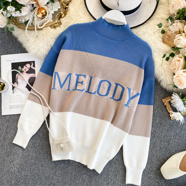 Alkalmi női pulóver pólógallérral és felirattal három színben