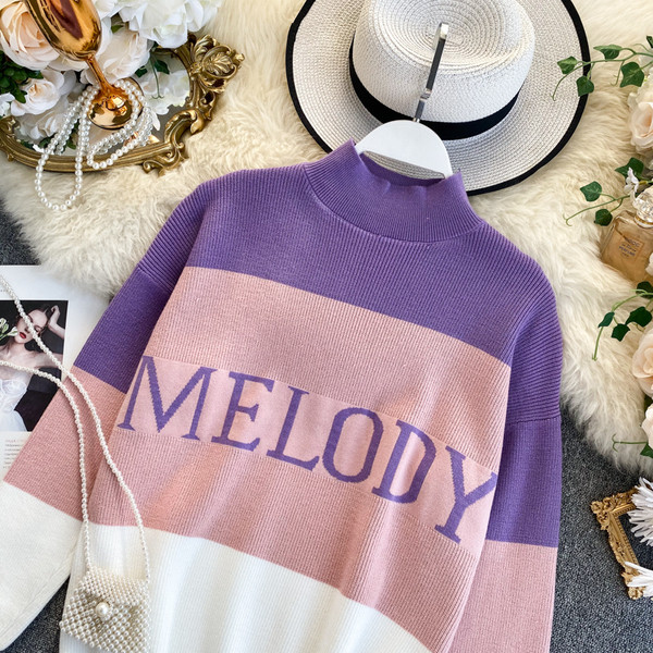 Alkalmi női pulóver pólógallérral és felirattal három színben