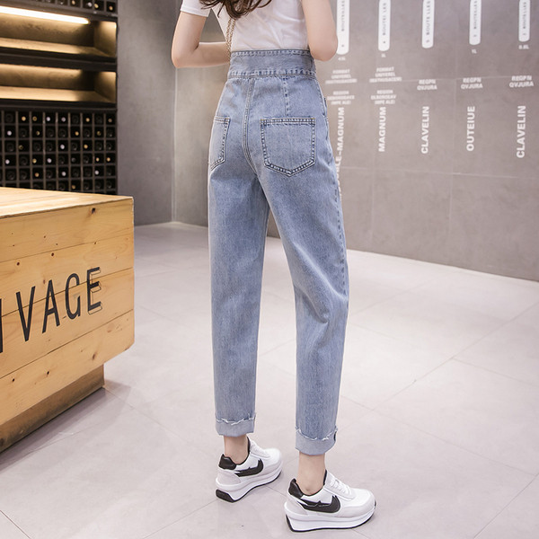 Alkalmi női farmer magas derékkal és kék zsebekkel