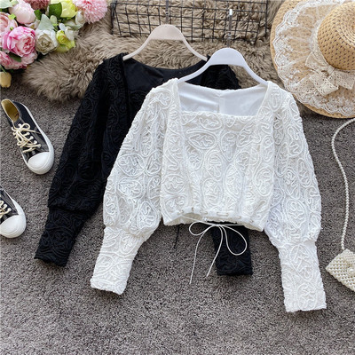 Modern női csipkeblúz négyzet alakú nyakkivágással, megkötővel fehér és fekete színben