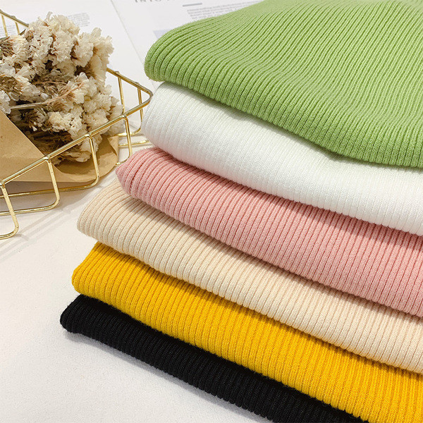 Modern női pulóver magas gallérral több színben