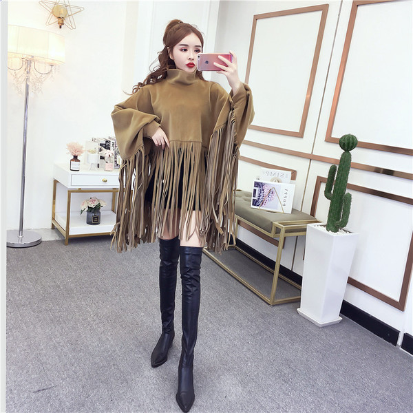 Öko velúrból készült modern női poncsó rojtokkal