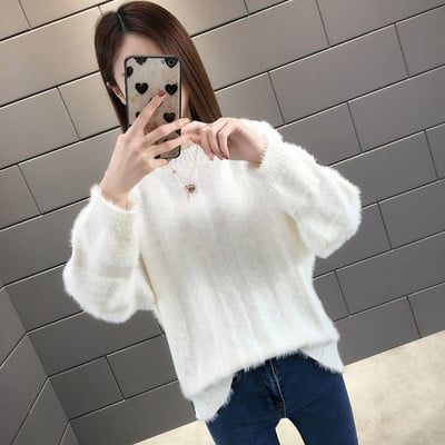 Modern női pehelypulóver kerek nyakkivágással, sok színben