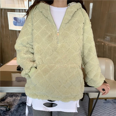 Női széles pulóver cipzárral és zsebekkel