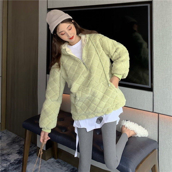 Női széles pulóver cipzárral és zsebekkel