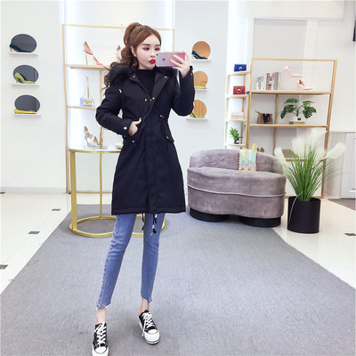 Hosszú téli kabát fűzővel és kapucnival pehelyes