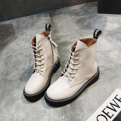 Bőr női téli csizma fűzős fekete-fehér színben