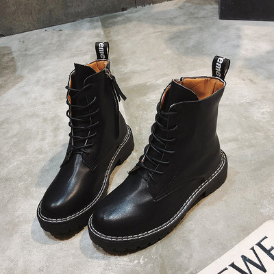 Bőr női téli csizma fűzős fekete-fehér színben