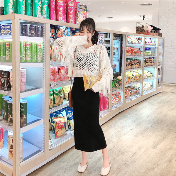 Γυναικείο μοντέρνο πουλόβερ  με λαιμόκοψη και κρόσσια