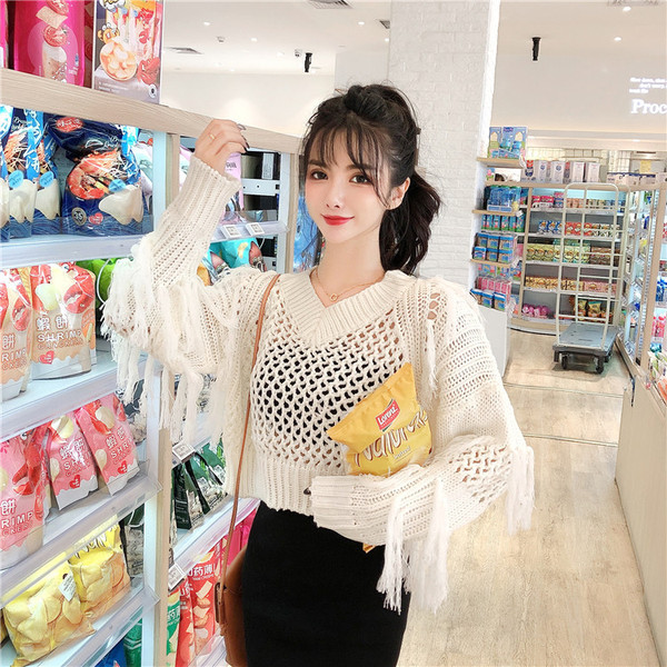 Γυναικείο μοντέρνο πουλόβερ  με λαιμόκοψη και κρόσσια