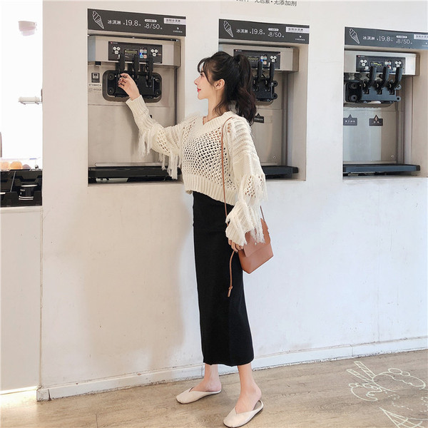 Γυναικείο μοντέρνο πουλόβερ  με λαιμόκοψη και κρόσσια