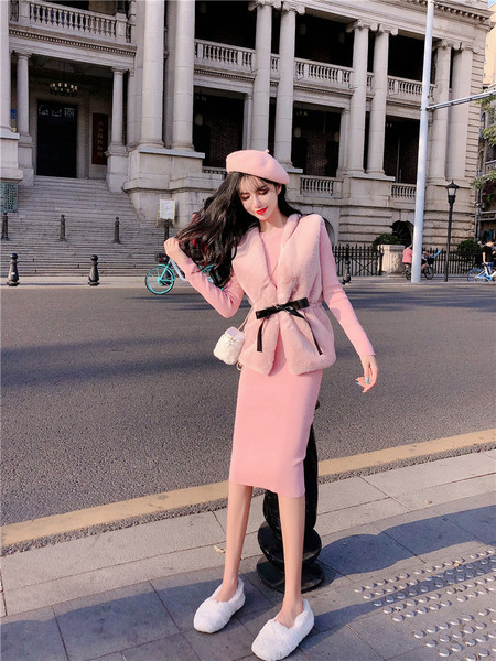 Rövid női pehelymellény műbőr övvel