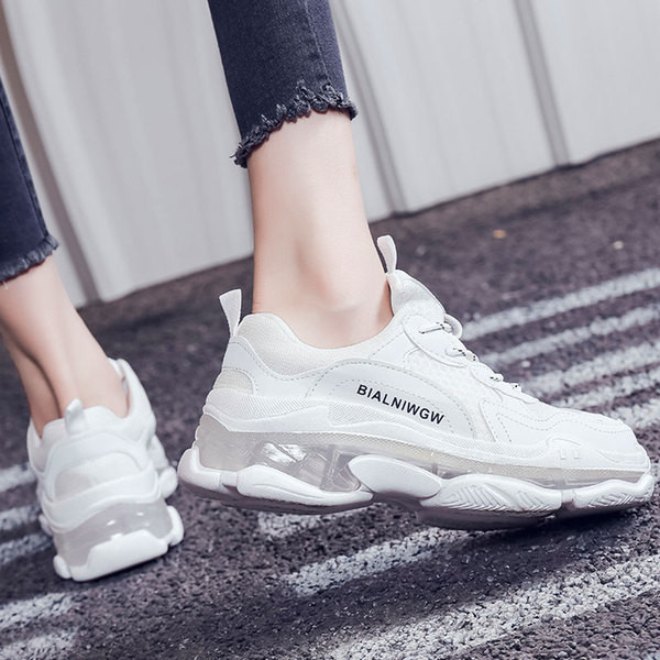 Μοντέρνα γυναικεία αθλητικά παπούτσια σε πράσινο, κίτρινο και λευκό χρώμα