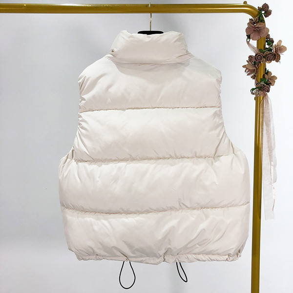 Rövid téli mellény fehér, zöld és fekete színekben