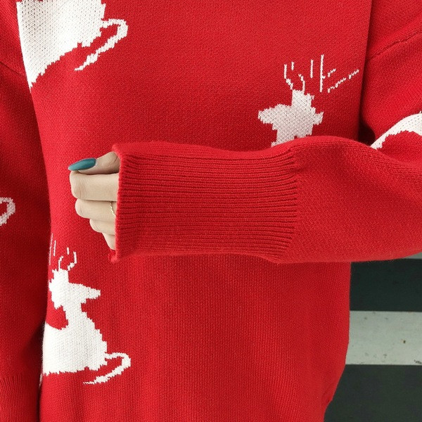 Hosszú és széles piros pulóver rátéttel