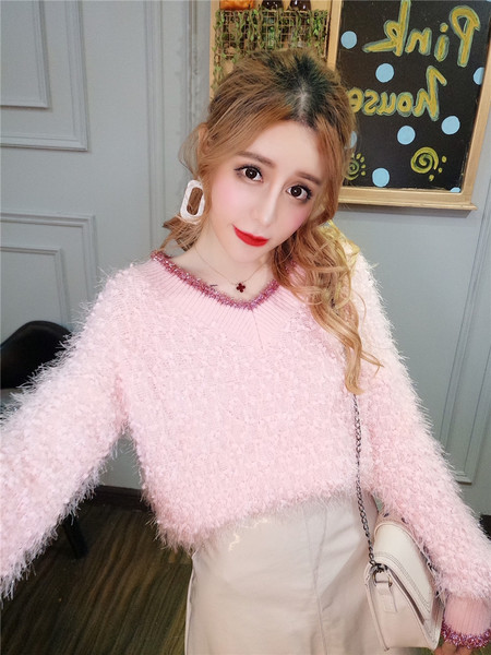 Γυναικείο πουλόβερ με λαιμόκοψη και κρόσσια