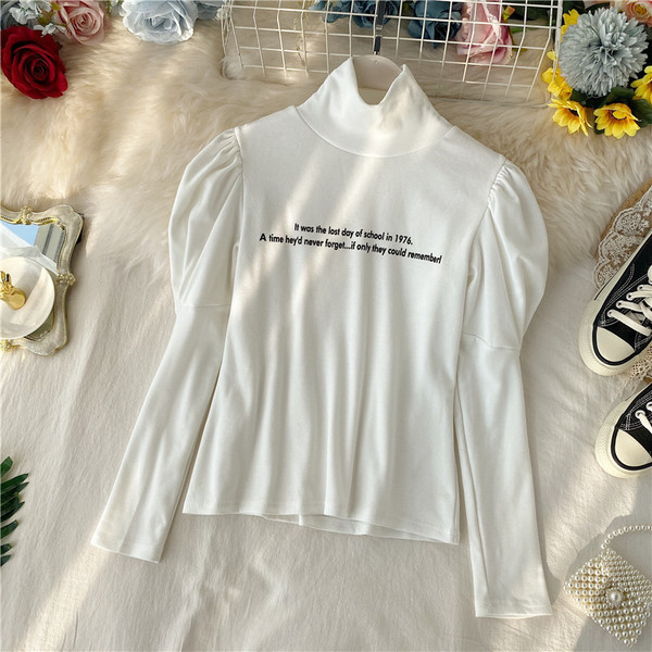 Μοντέρνα γυναικεία μπλούζα με υψηλό κολάρο σε διάφορα χρώματα