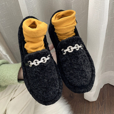 Lapos talpú női pehelycipő fekete-fehér színben