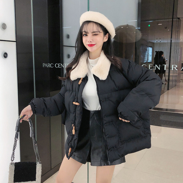 Női téli kabát tollas gallérral, fekete és barna színben