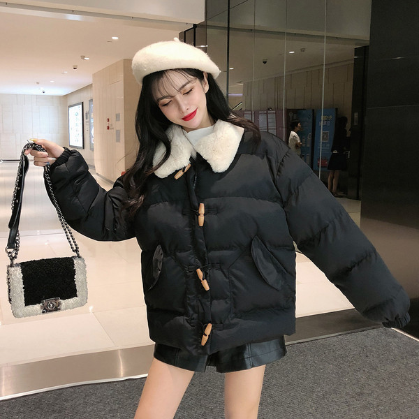 Női téli kabát tollas gallérral, fekete és barna színben