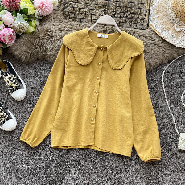 Modern női ing gombokkal és ovális nyakkivágással, négy színben