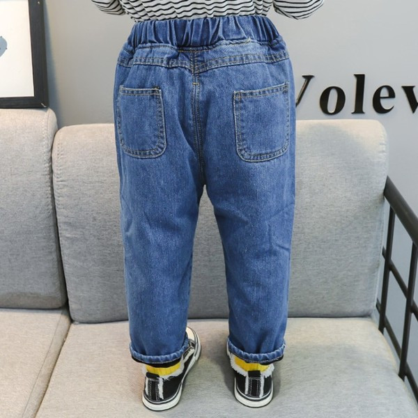 Μοντέρνα παιδικά τζιν με κορδέλα και μπλε κουμπιά για κορίτσια
