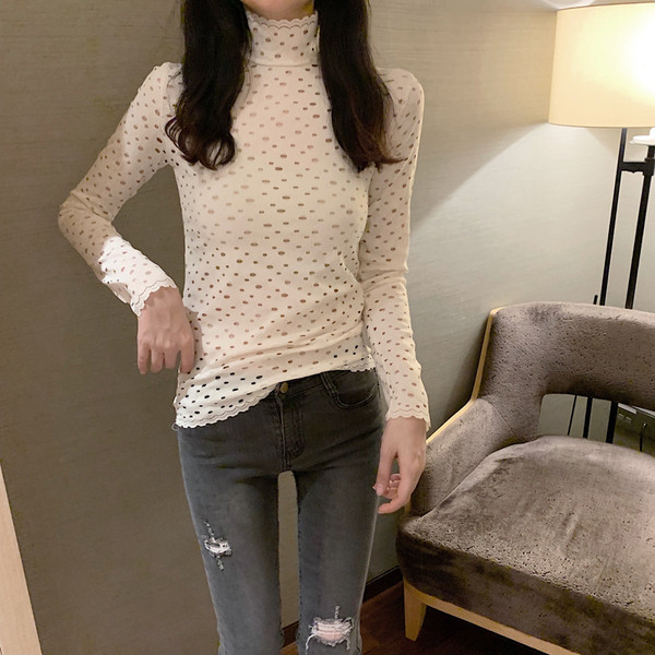 Modern női blúz magas pólógallérral, fehér és fekete színben