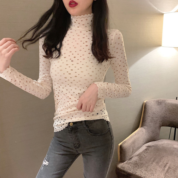 Modern női blúz magas pólógallérral, fehér és fekete színben