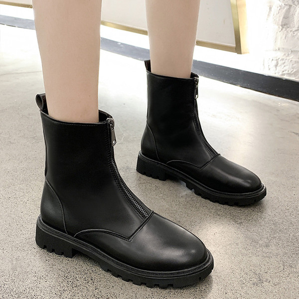 Őszi-téli női bőrcsizma cipzárral fekete színben