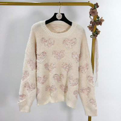 Női téli pulóver rátéttel és gyöngyökkel