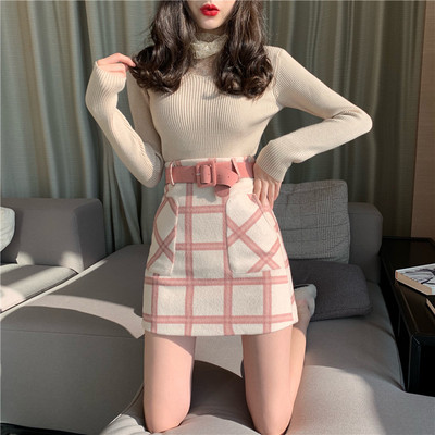 Stílusos női szoknya magas derékkal, rózsaszín és zöld övvel