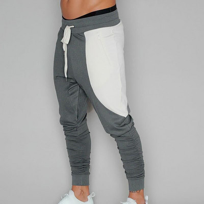 Férfi ellentmondásos nadrág fekete és szürke nyakkendővel