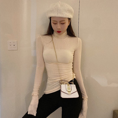 Női testhezálló blúz polo gallérral, sok színben