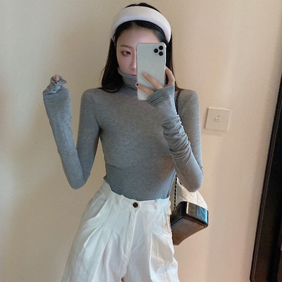 Női testhezálló blúz polo gallérral, sok színben