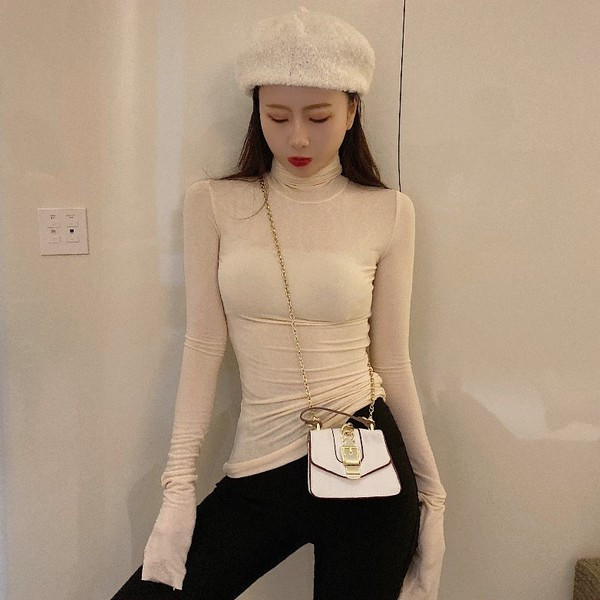 Női testhezálló blúz polo gallérral, sok színben