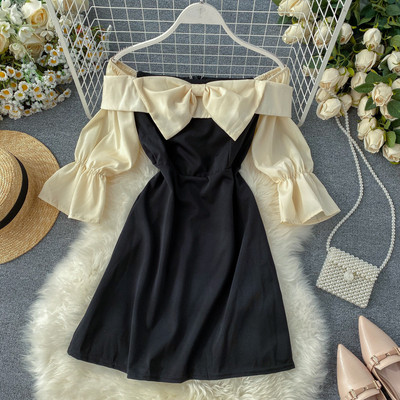 Modern női ruha rózsaszín és sárga szalaggal