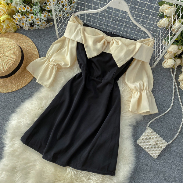 Modern női ruha rózsaszín és sárga szalaggal