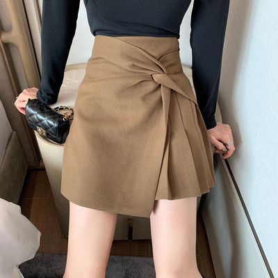 Къса асиметрична пола в кафяв и черен цвят