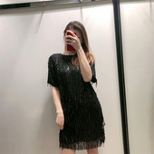 Stílusos női ruha csillogó hatású fekete és zöld színben