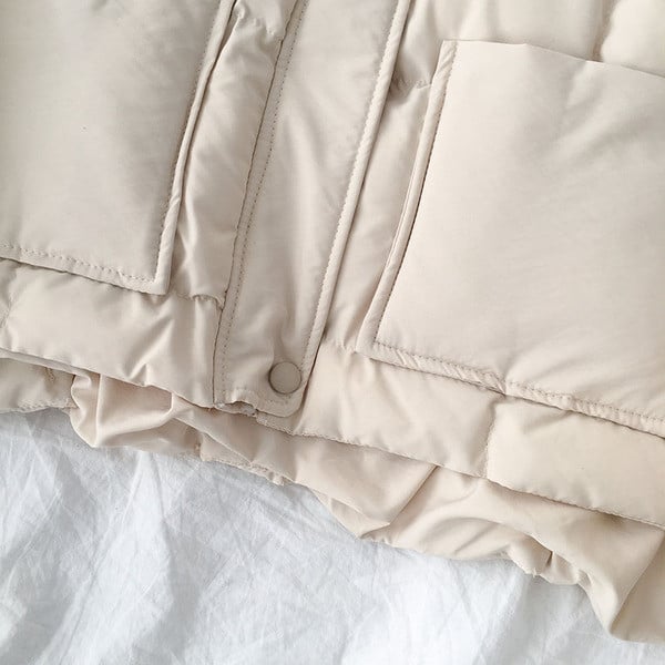 Geaca de dama moderna cu guler inalt si panglica in bej si negru