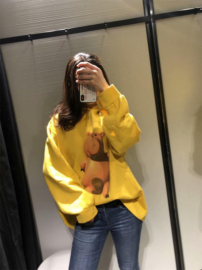 Modern női pulóver színes sárga rátéttel