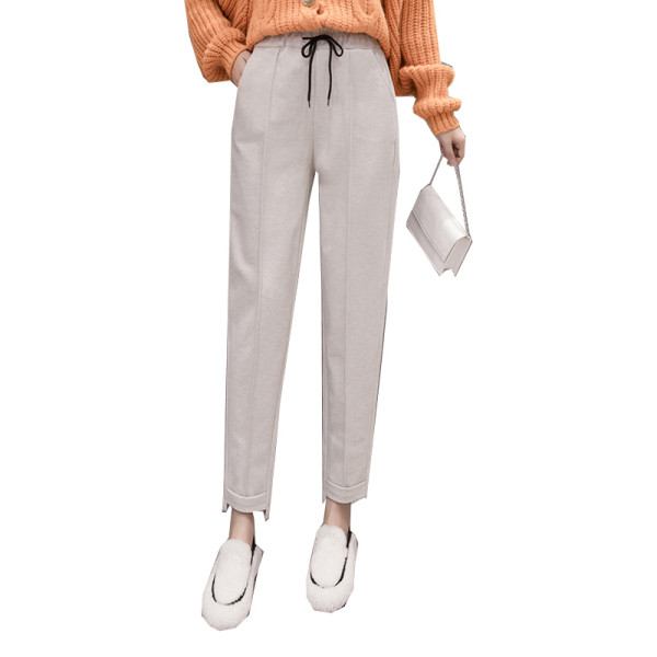 Divatos női nadrág zsebekkel fehér és fekete színben