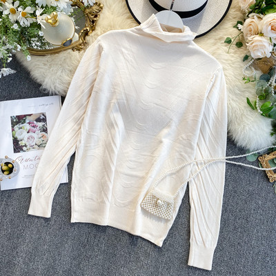 Modern női pulóver magas pólógallérral, több színben