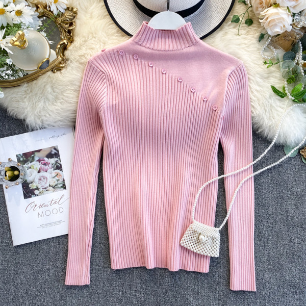 Μοντέρνο γυναικείο πουλόβερ με κουμπιά και ψηλό κολάρο 