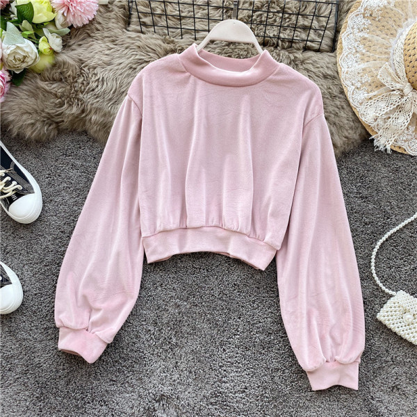 Modern női blúz hosszú ujjal és ovális nyakkivágással, különböző színekben