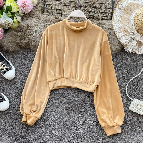 Modern női blúz hosszú ujjal és ovális nyakkivágással, különböző színekben